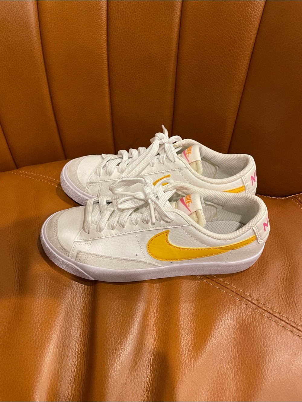 Nike Blazer White Low-Top Sneakers with Yellow Swoosh and Pink Heel Accent